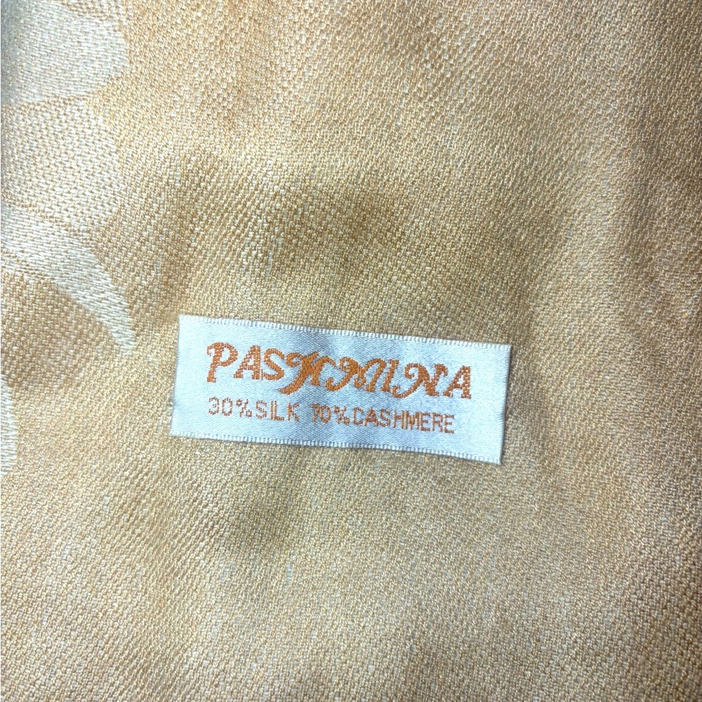 NWOT. Beautiful Pashmina in gorgeous color with flower pattern.